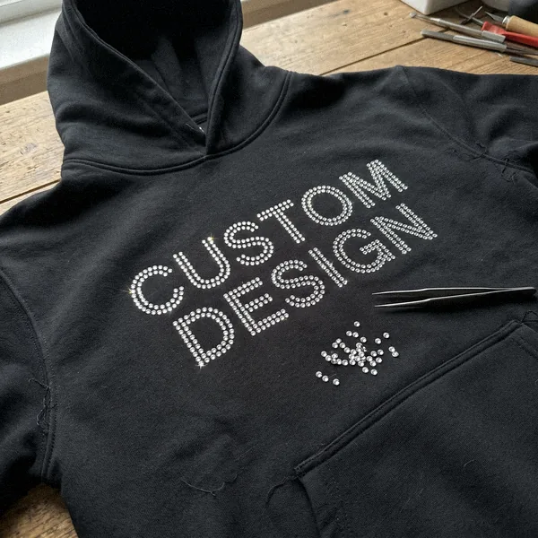 Rhinestone CUSTOM DESIGN lettering on a black hoodie