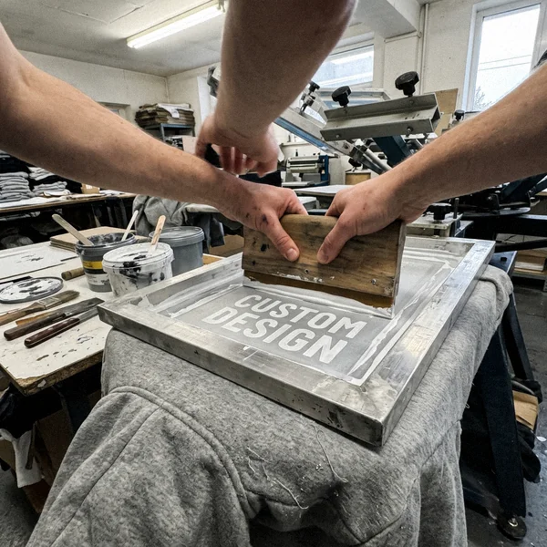 Screen printing CUSTOM DESIGN on the back of a fleece tracksuit hoodie